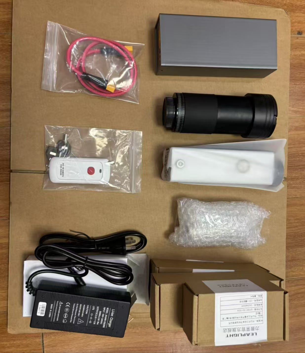 YZ260-DIY Laser Cannon. 260W (Battery DC 33.6V 5Ah; Wavelength 915). Range 30-50 meters. Battery life 5 years, with fast charging.